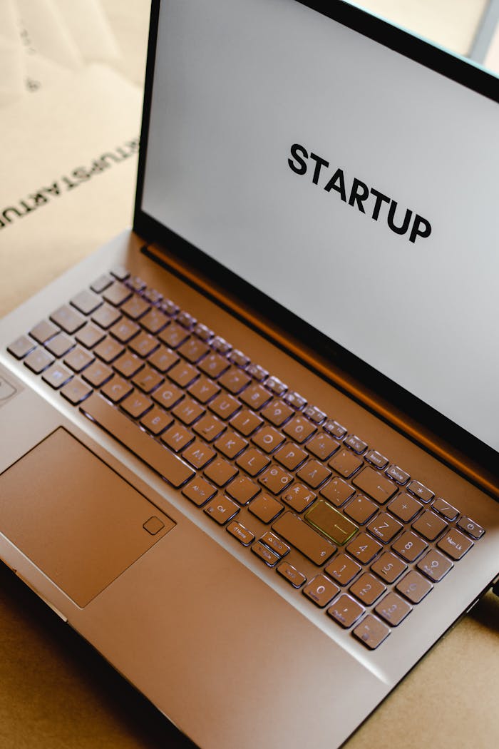 Sleek laptop displaying the word STARTUP, ideal for tech and business themes.